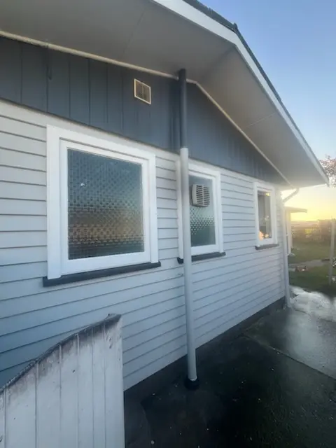 Back of house being painted
